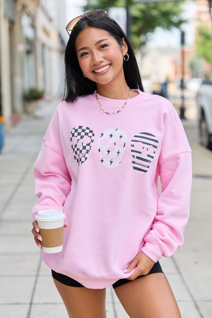 Skulls Trio Light Pink Graphic Sweatshirt