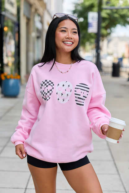 Skulls Trio Light Pink Graphic Sweatshirt